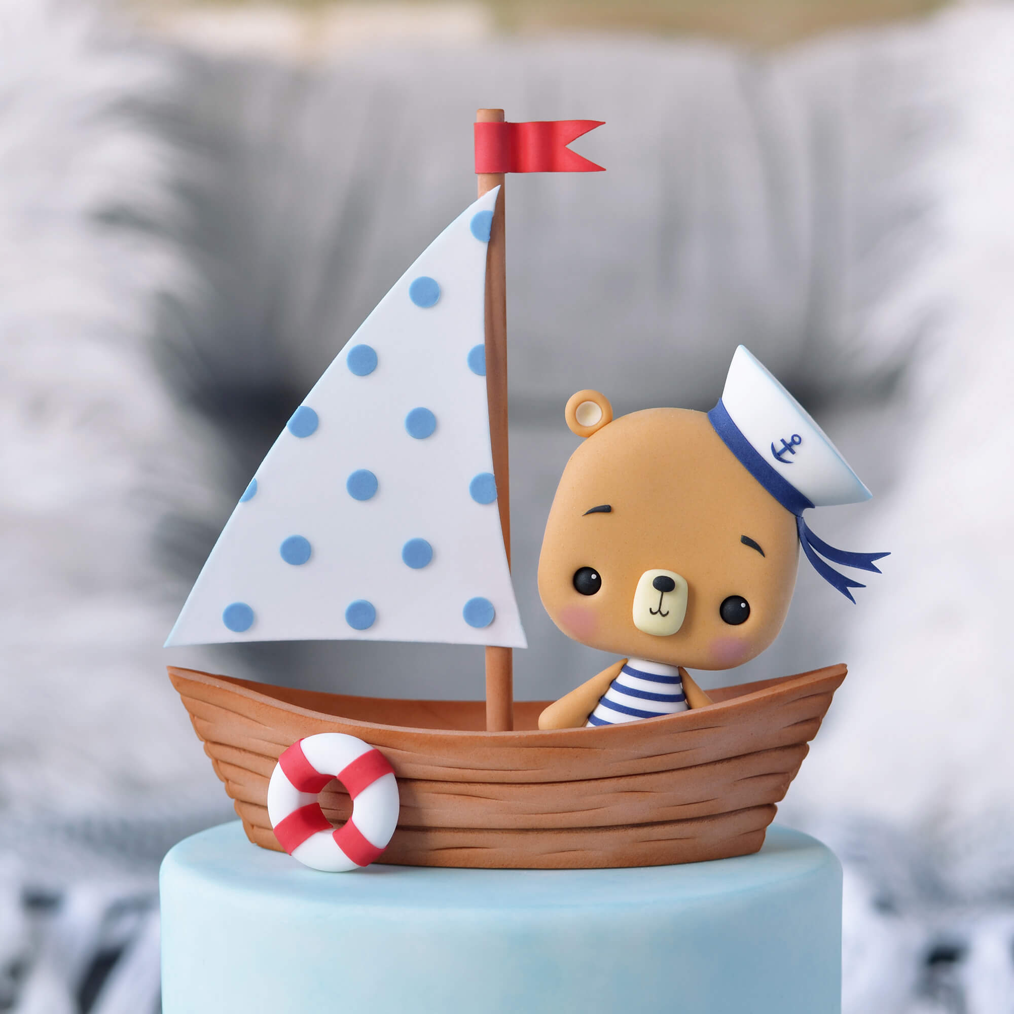 Teddy bear in a boat cake decoration